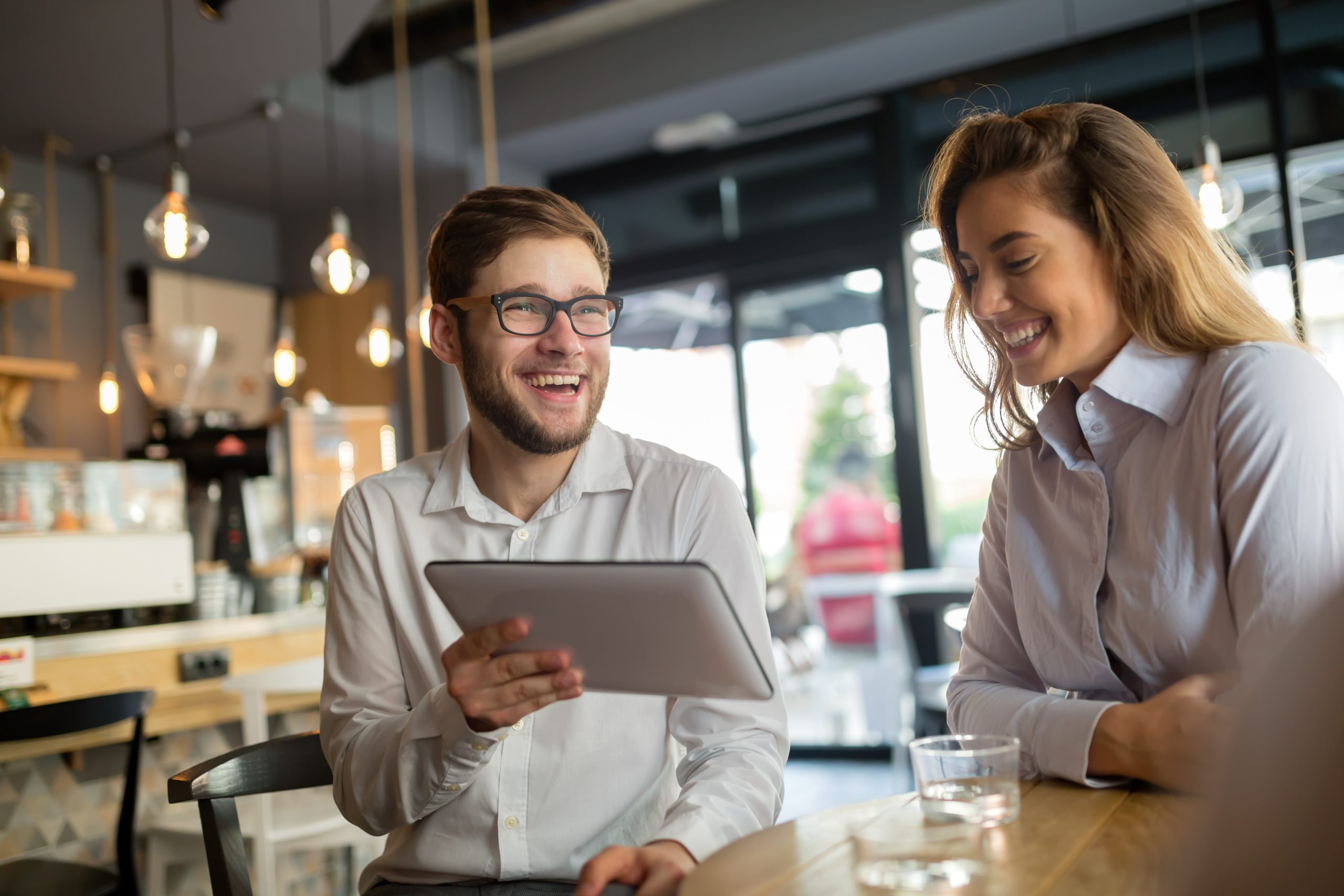 Business people talking and laughing together